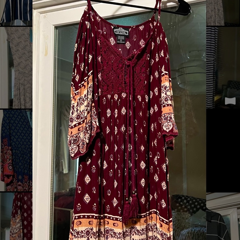 Loose fitting, beachy maroon dress with open shoulders. Used.